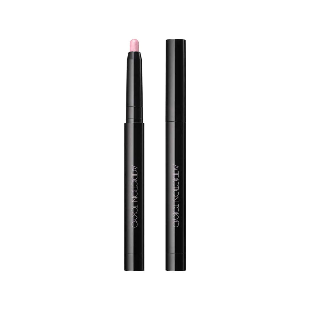 Addiction The Creamy Stick Eyeshadow in a sleek black tube with a soft pink shade, ideal for long-lasting eye makeup.