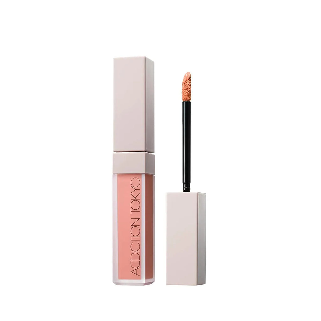 Addiction Tokyo The Liquid Blush Foggy in coral shade with a soft-focus texture and precise applicator for a vibrant glow.