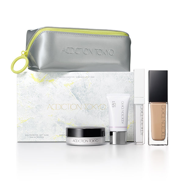 Addiction Glow Kit featuring foundation, primer, and face powder for flawless makeup application