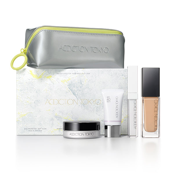 Addiction Glow Kit featuring foundation, primer, and face powder for flawless makeup application