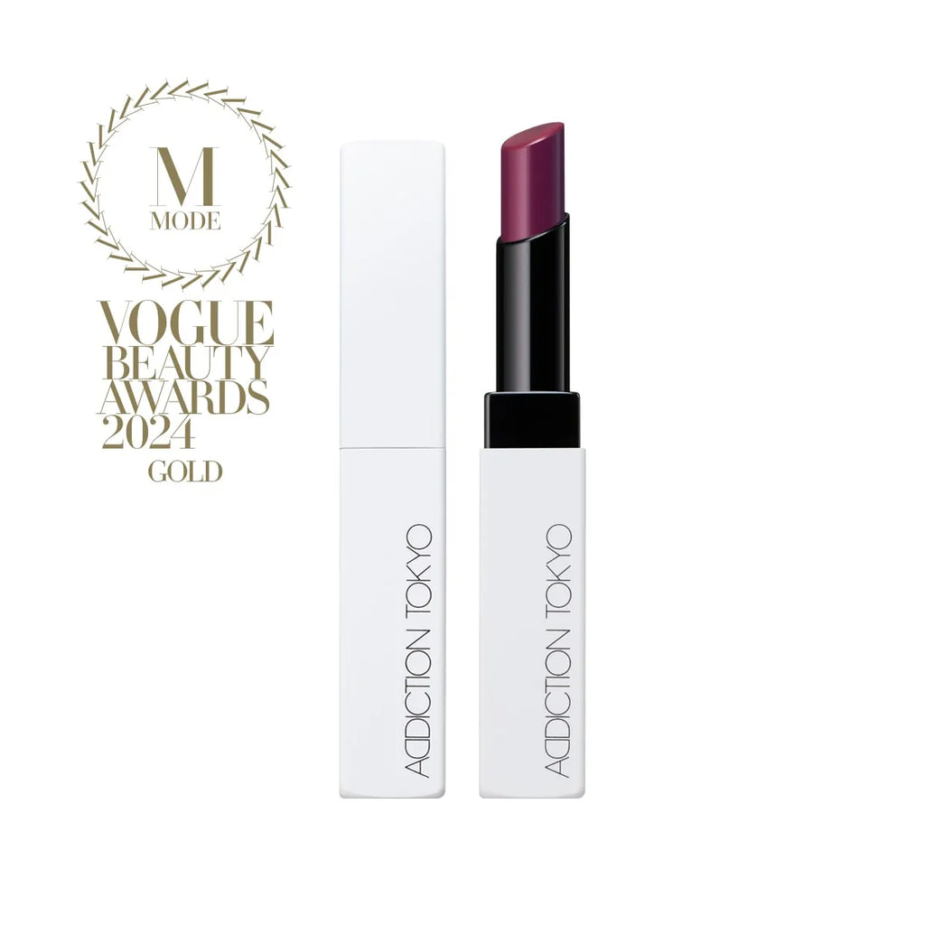 Addiction Tokyo The Lip Balm Soft Matte in plum shade with minimalist white packaging, Vogue Beauty Awards 2024 Gold winner.