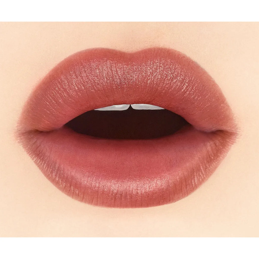 Close-up of lips wearing Addiction Tokyo The Lip Balm Soft Matte in a red-brown shade, showcasing a soft matte finish.