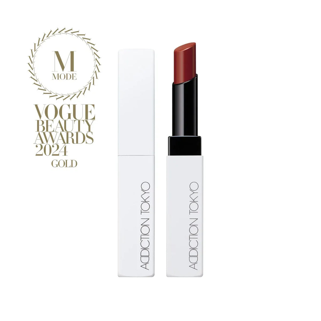 Addiction Tokyo The Lip Balm Soft Matte in red-brown shade with sleek white packaging, awarded Vogue Beauty Awards 2024 Gold.