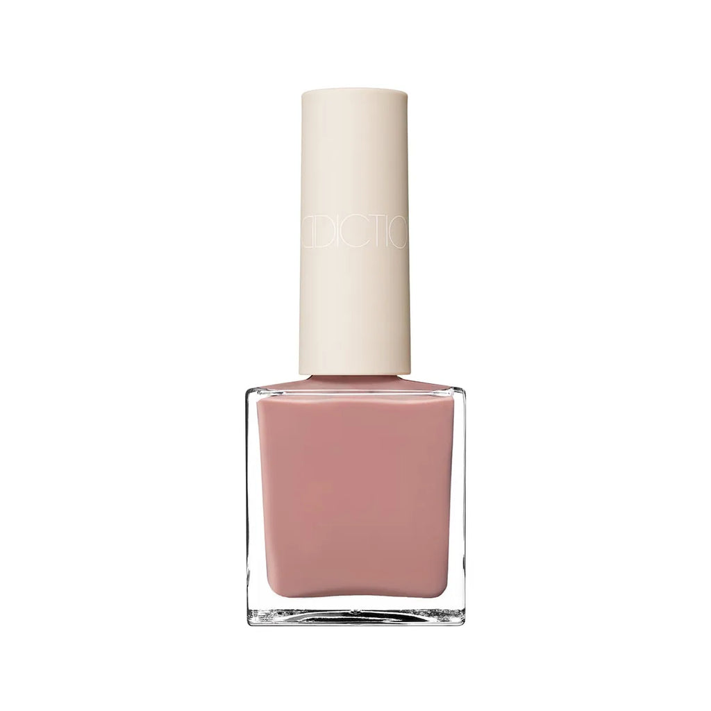 Addiction Tokyo Nail Polish in a muted mauve shade with a glossy finish. Quick-drying, long-lasting, and 9-free for healthier nails.