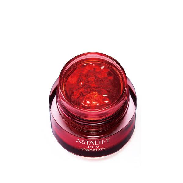 Open jar of Astalift Jelly Auqarysta serum showcasing its rich, jelly-like texture for deep skin hydration.