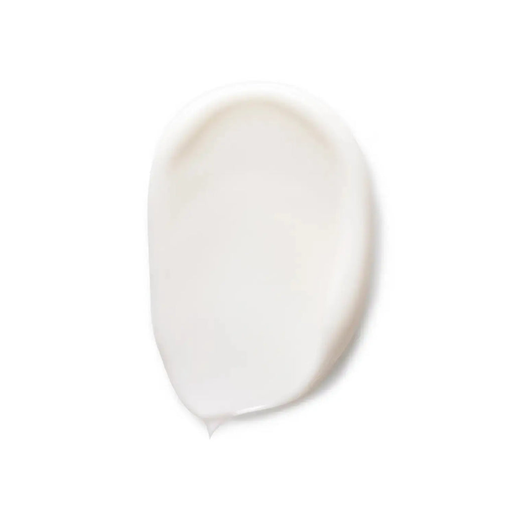 Close-up of Baum Hand Cream texture, showcasing smooth and creamy formula for hydration and skin protection.