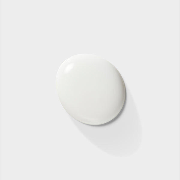 Baum Moisturizing Emulsion product bottle displayed on a light background, hydrating skincare for radiant skin