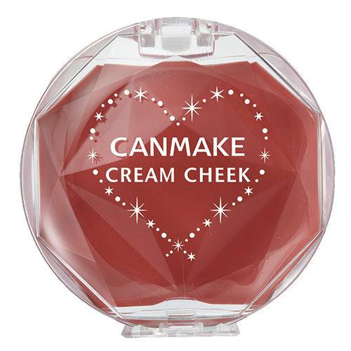 Canmake Cream Check 2.2g in red shade with a heart design on the compact, ideal for a bold and luminous cheek look.