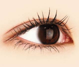 Close-up of an eye with Canmake Metal Look Mascara applied, highlighting defined and bunched eyelashes for a trendy look.