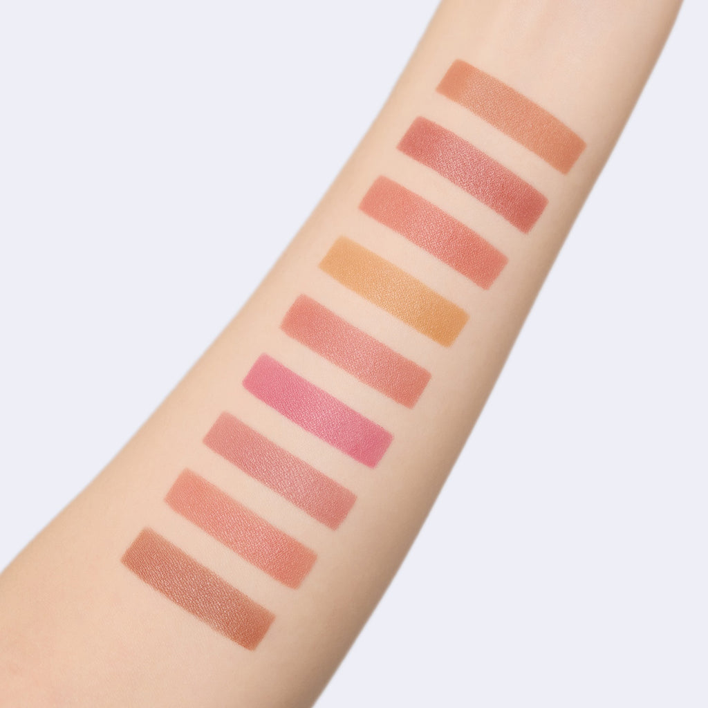 Celvoke makeup highlighting expressive lips with vibrant, long-lasting pigment for a refined, elegant look