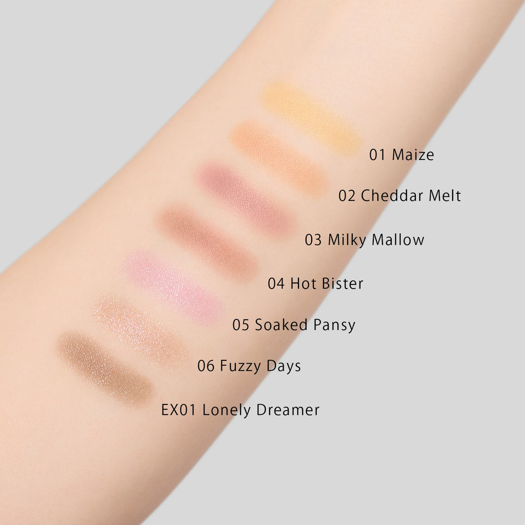 Swatches of Celvoke Vatik Eyes S shades 01 Maize, 02 Cheddar Melt, 03 Milky Mallow, 04 Hot Bister, 05 Soaked Pansy, 06 Fuzzy Days, and EX01 Lonely Dreamer on skin.