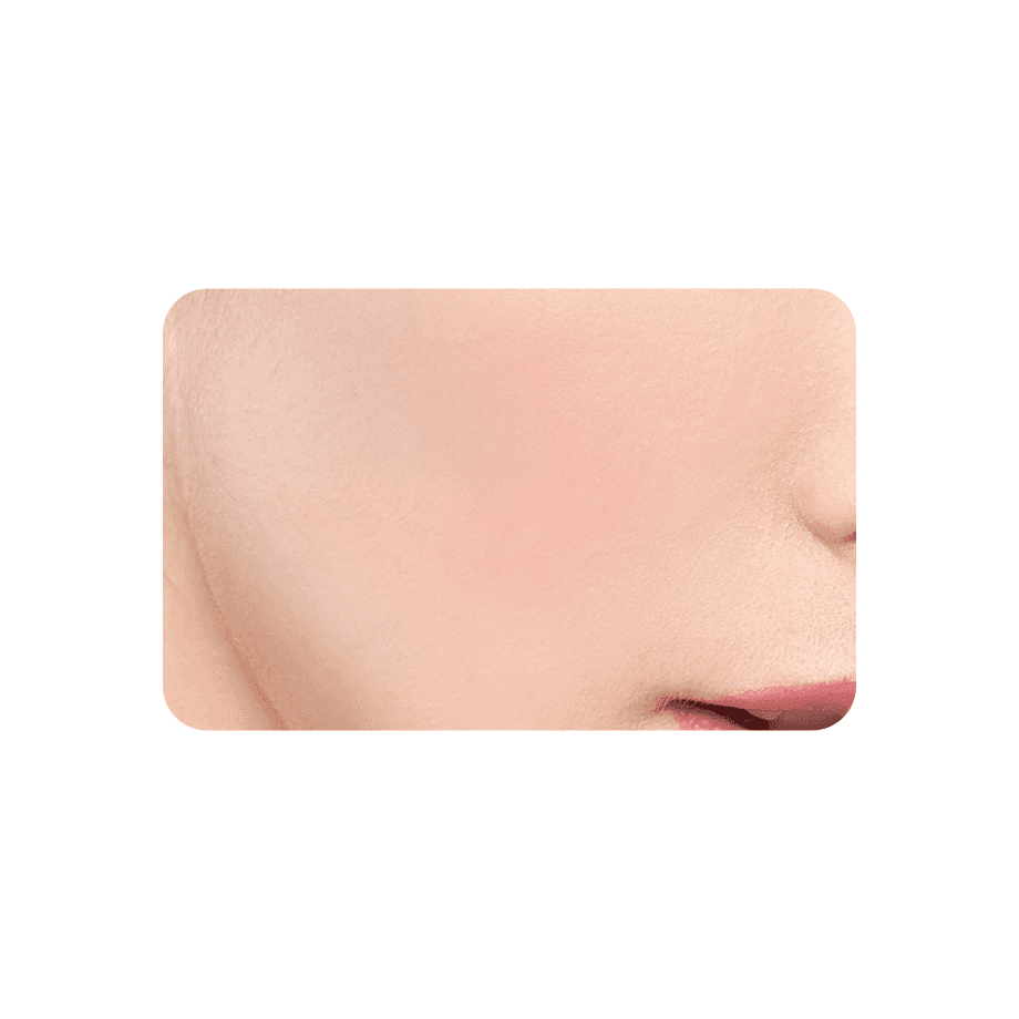 Close-up of a nude-toned Cezanne Cheek Blush applied on skin, offering a subtle and natural finish.