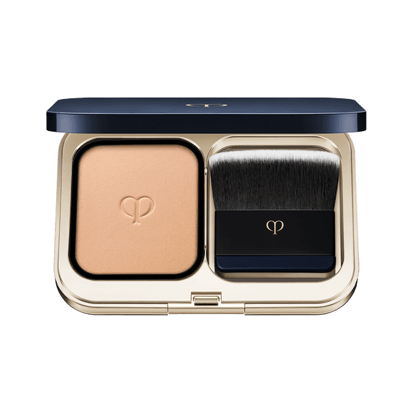 Clé de Peau Beauté Teint Pouder Éclat Ⅱ foundation in a luxurious compact with a precision brush for effortless, radiant coverage.