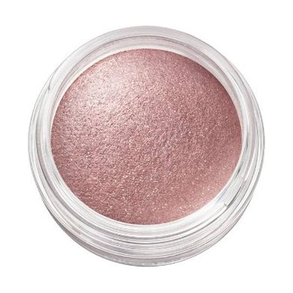 Close-up of Cosme Decorté Eye Glow Gem Skin Shadow in a mauve pink shade, highlighting its silky and luminous texture.
