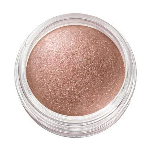 Close-up of Cosme Decorté Eye Glow Gem Skin Shadow in a warm brown shade, highlighting its smooth and vibrant texture.