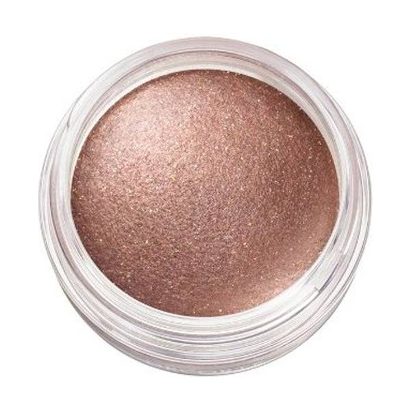 Close-up of Cosme Decorté Eye Glow Gem Skin Shadow in a plum brown shade, highlighting its silky and luminous texture.