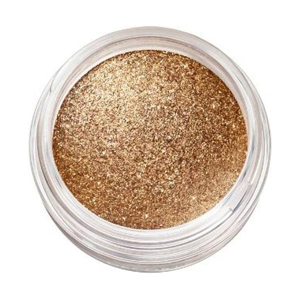 Close-up of Cosme Decorté Eye Glow Gem Skin Shadow in a glittery gold shade, highlighting its sparkling and radiant texture.