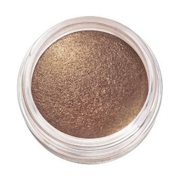 Close-up of Cosme Decorté Eye Glow Gem Skin Shadow in a deep brown shade, emphasizing its metallic and smooth texture.
