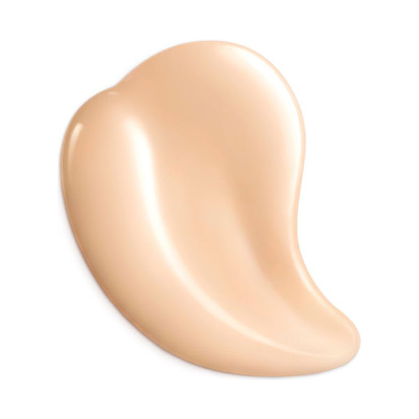 Close-up of Cosme Decorté Zen Wear Glow foundation swatch showcasing its smooth, creamy texture and radiant finish.