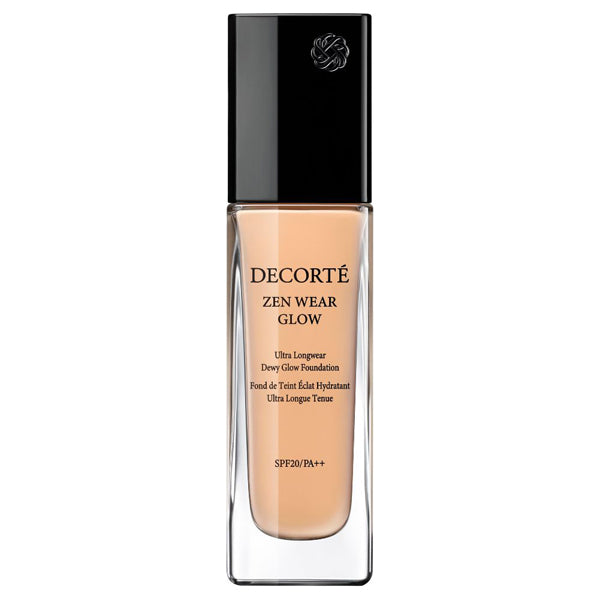 Cosme Decorté Zen Wear Glow 30ml foundation in a sleek glass bottle with black cap, offering long-lasting dewy glow finish.