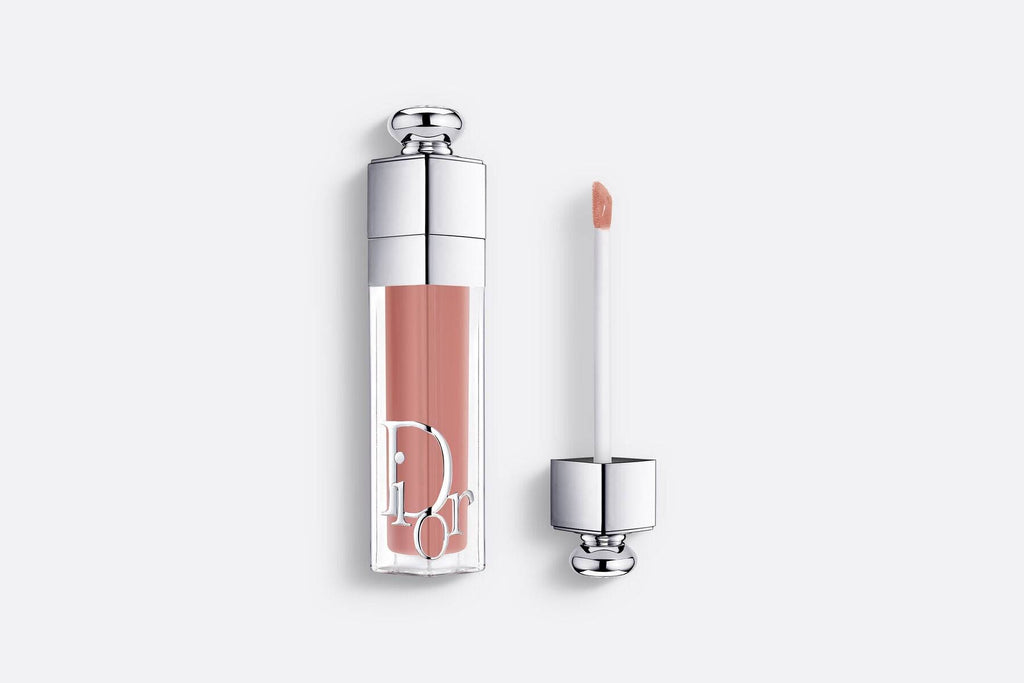 Dior Addict Lip Maximizer in Nudemania, a limited-edition lip gloss with a warm nude hue for a natural, plumping, and hydrating effect.