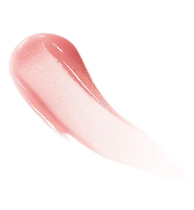 Swatch of Dior Addict Lip Maximizer in Peachmania, showcasing its sheer peach tint with a glossy, moisturizing formula for fuller-looking lips.