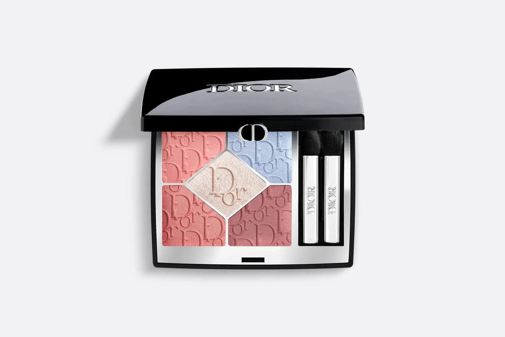 Dior Show 2025 Palette in warm pastel shades. Limited edition eye shadow with embossed Dior logo, featuring coral, blue, and neutral tones.