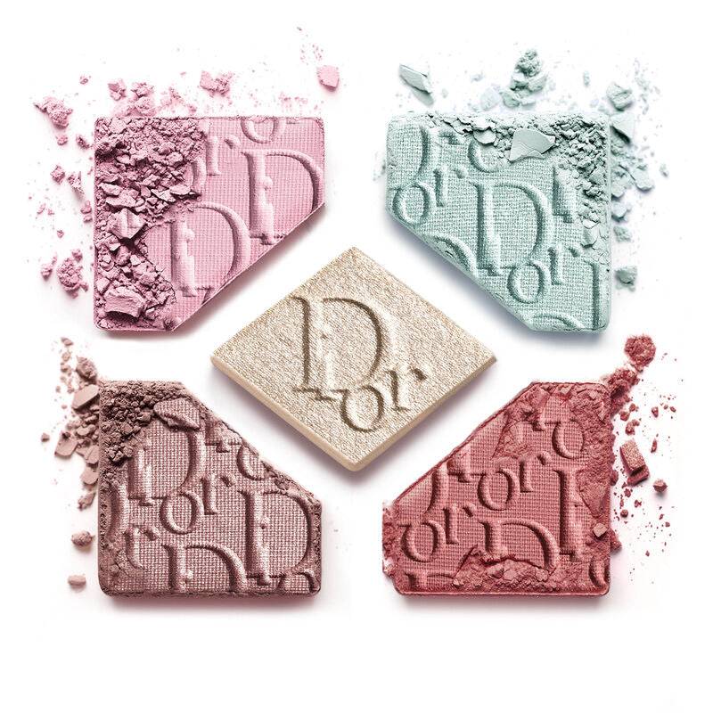 Crushed Dior Show 2025 eye shadows in cool pastel shades. Embossed powders in pink, mint, and neutral hues for a luminous spring finish.