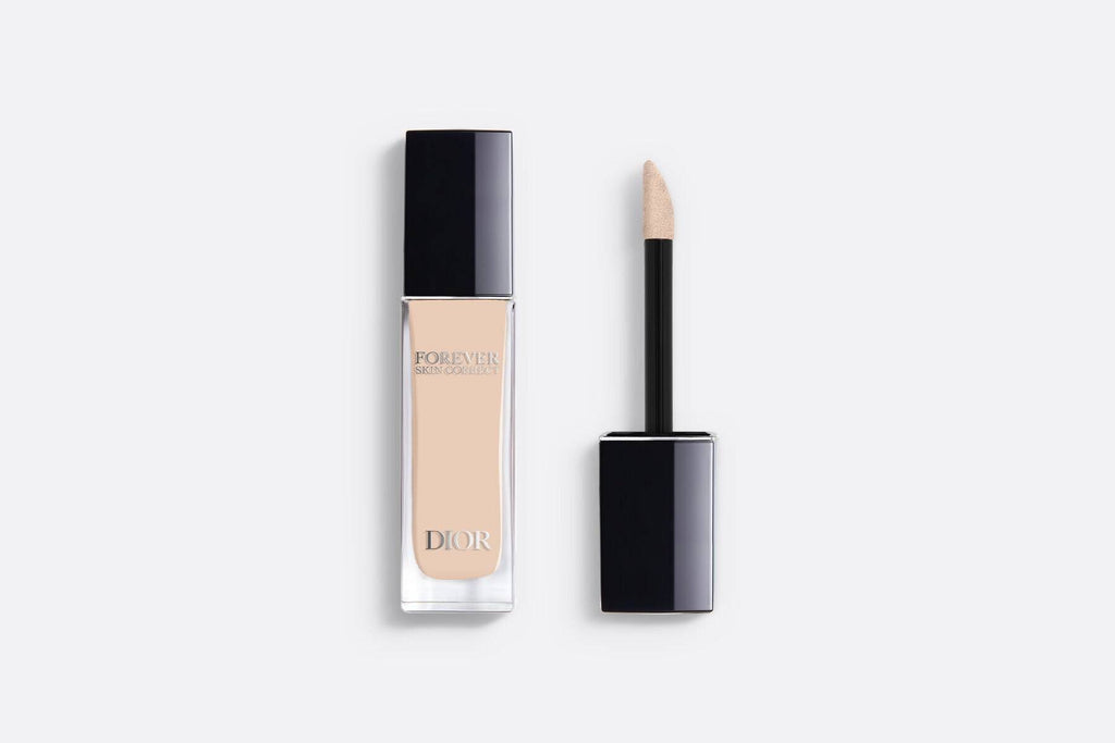 Dior Skin Forever Concealer in a medium shade with applicator. Provides long-lasting coverage while hydrating and brightening the skin.