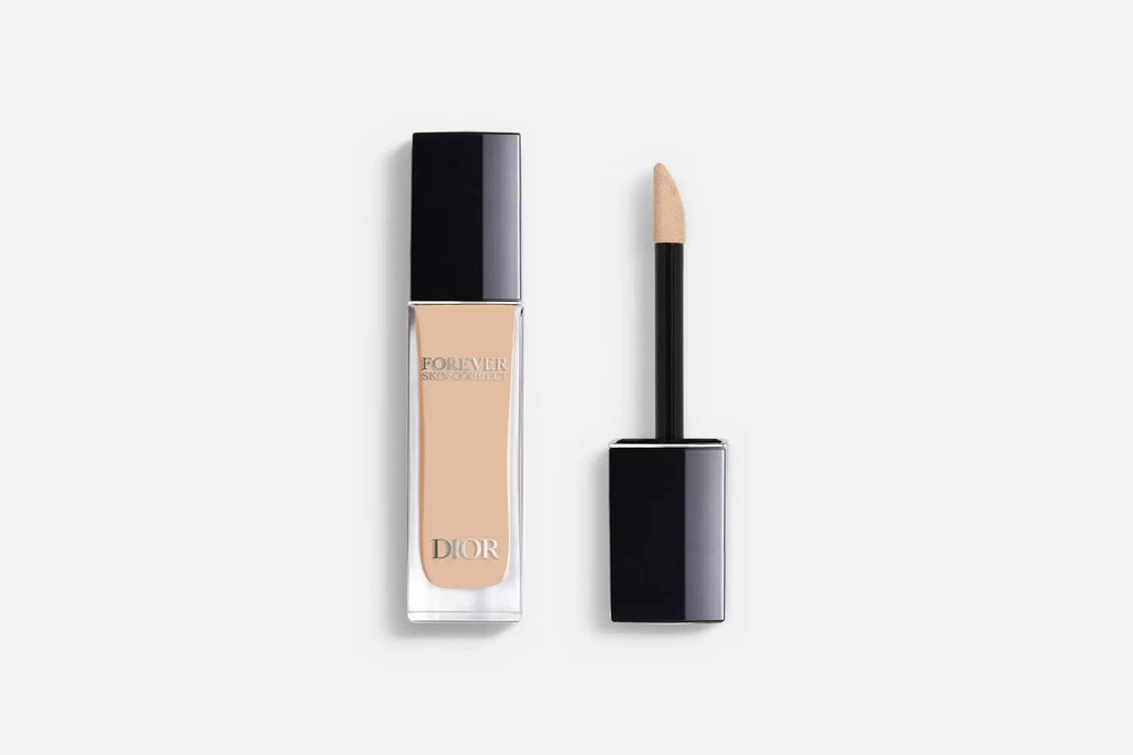 Dior Skin Forever Concealer in a warm light shade with applicator. Provides seamless, radiant coverage while hydrating and protecting the skin.