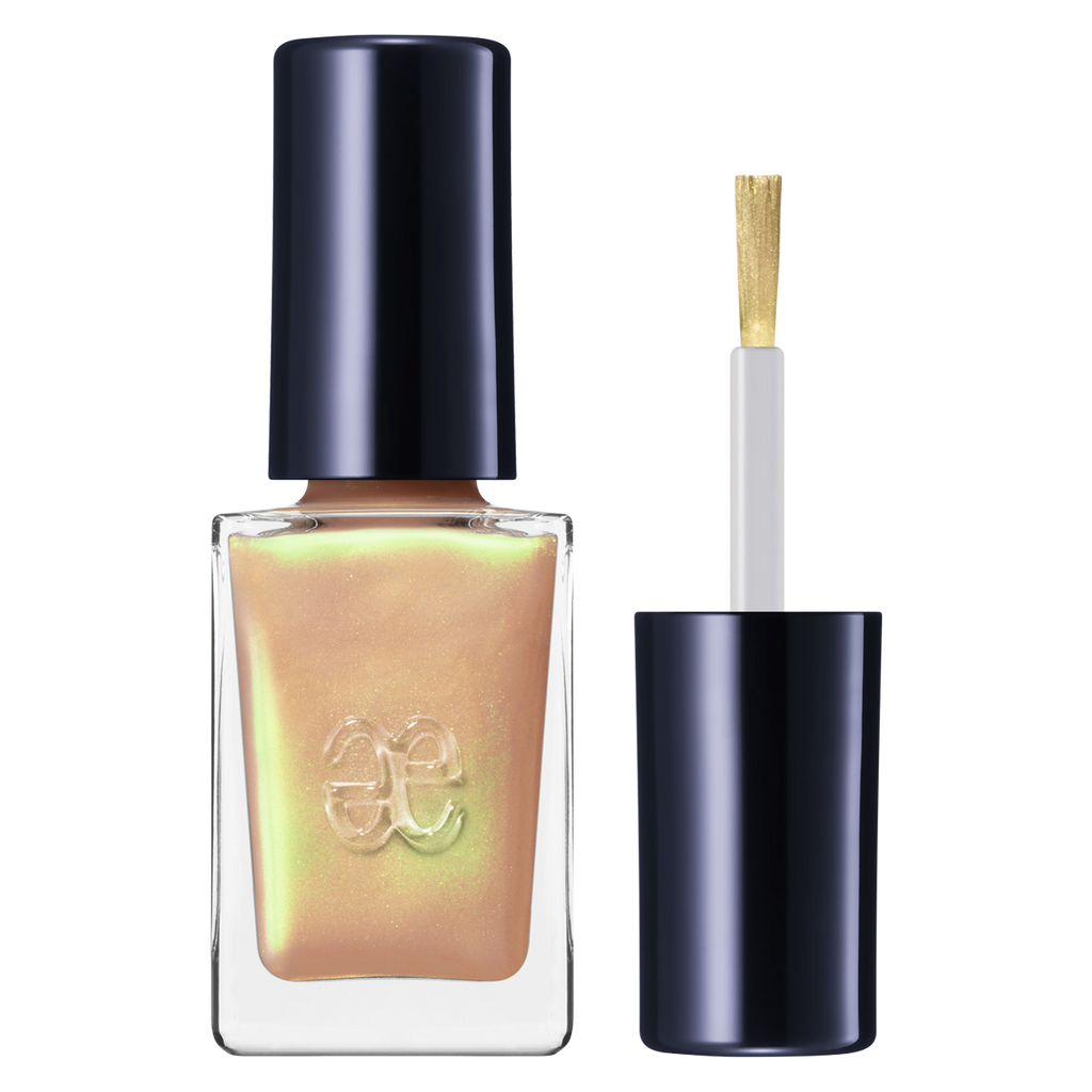 Elégance Lacquer in iridescent peach, offering a quick-drying formula with a subtle shimmer for delicate nail designs.