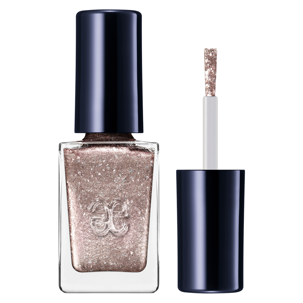 Elégance Lacquer in metallic rose gold, quick-drying and perfect for creating elegant nail art with a shimmering finish.