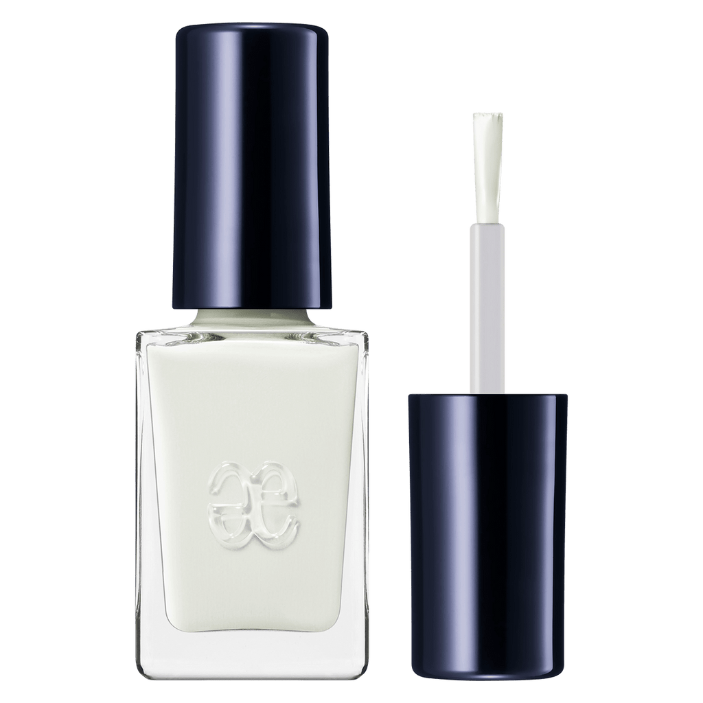 Elégance Lacquer in crisp white, offering a quick-drying formula for clean and minimalist nail designs.