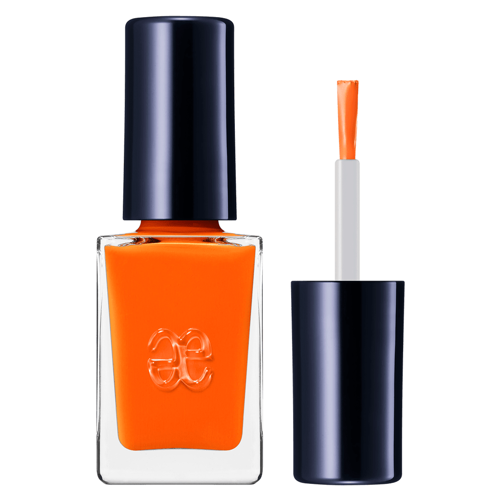 Elégance Lacquer in vibrant orange, quick-drying and perfect for creating bold nail art with a glossy finish.