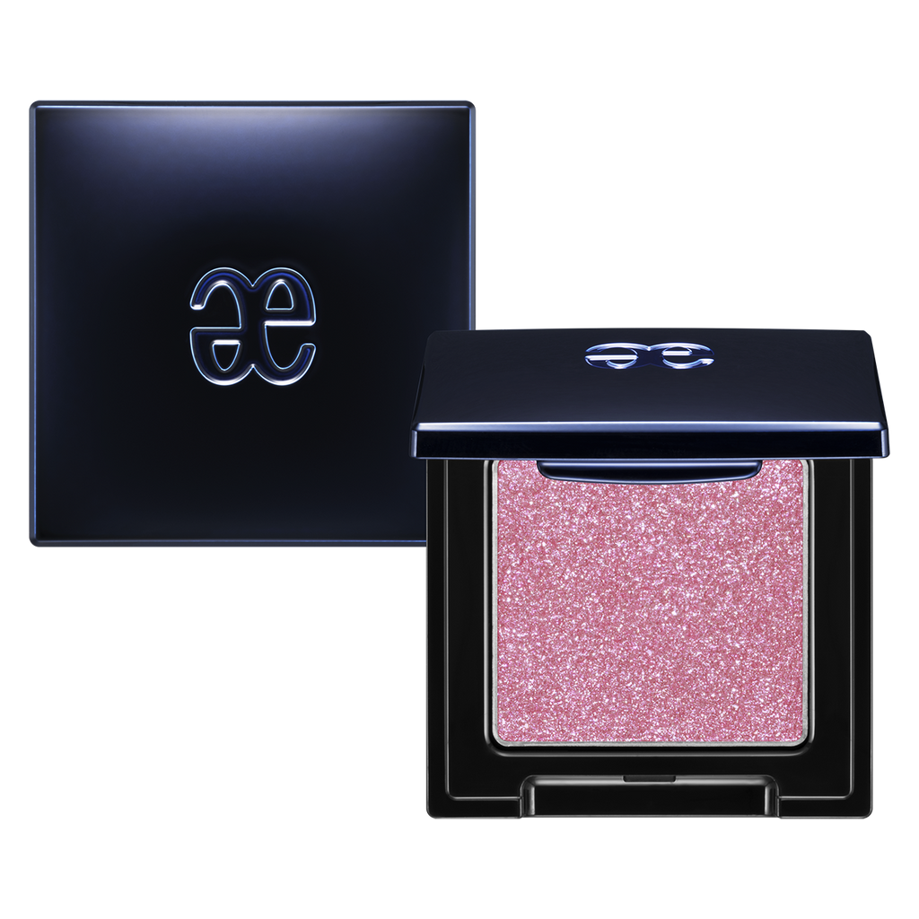 Elégance Razzle Eye Color in sparkling pink shade, housed in a stylish black compact. Ideal for creating bold and radiant eye makeup.