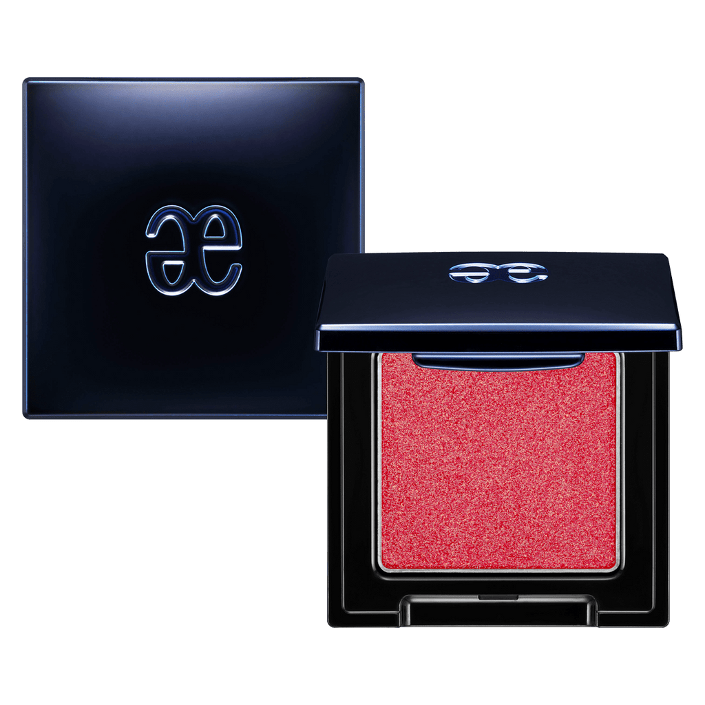 Elégance Razzle Eye Color in vivid red shade, housed in a sleek black compact. Perfect for bold and statement-making eye makeup.