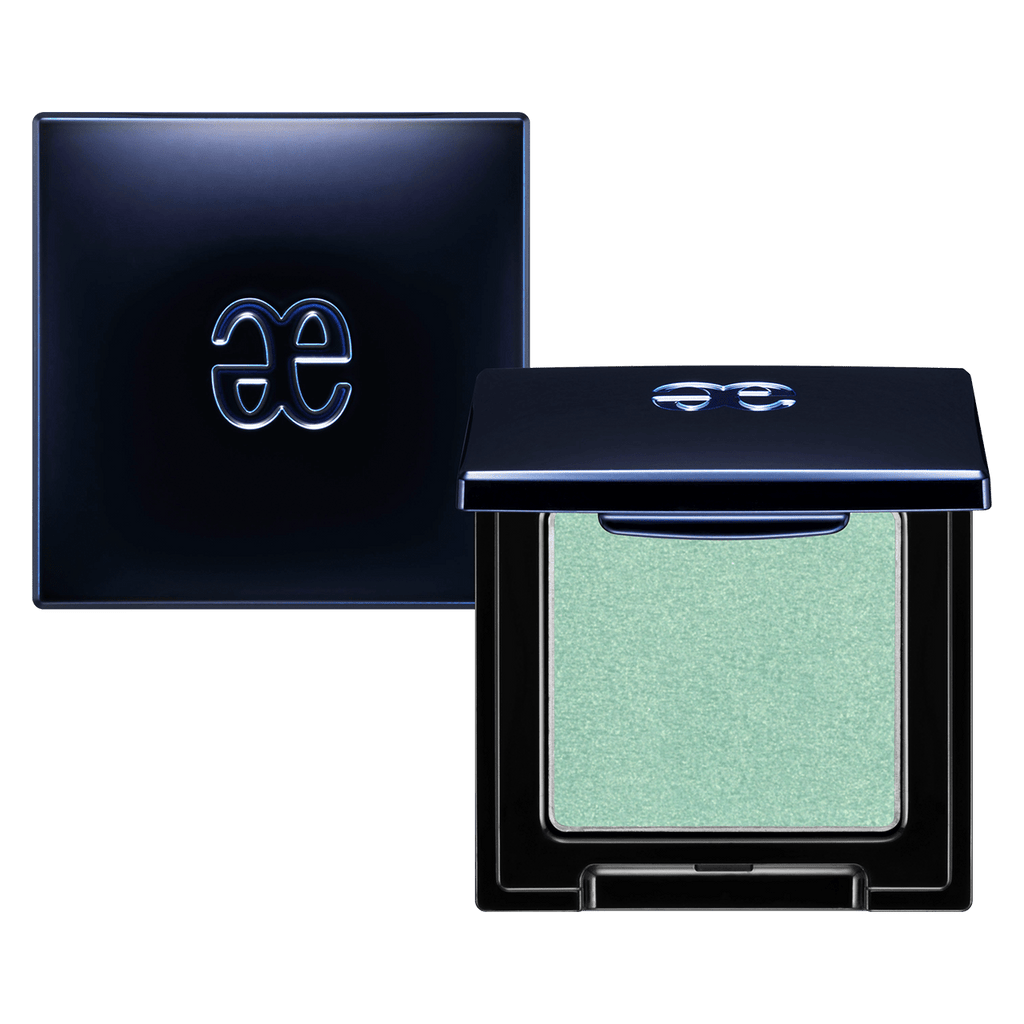 Elégance Razzle Eye Color in pastel green shade, presented in a chic black compact. Designed for soft and refreshing eye makeup.