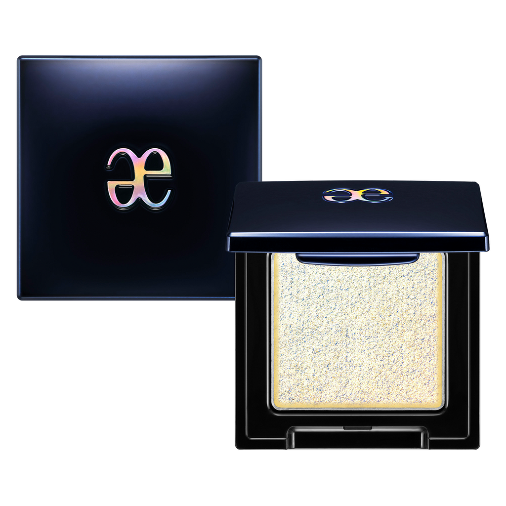 Elégance Razzle Star Eye Color in a sparkling silver shade with a metallic finish, encased in a chic black compact with a glossy logo.