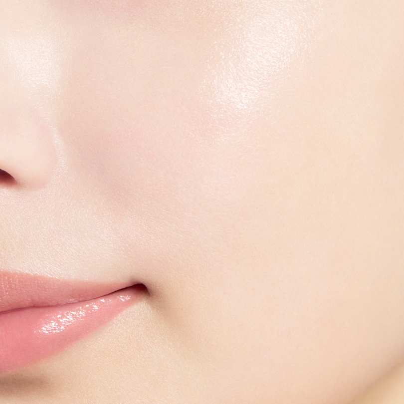 Close-up of smooth and radiant skin, demonstrating the flawless finish achieved with Ipsa Liquid Foundation e 25ml.