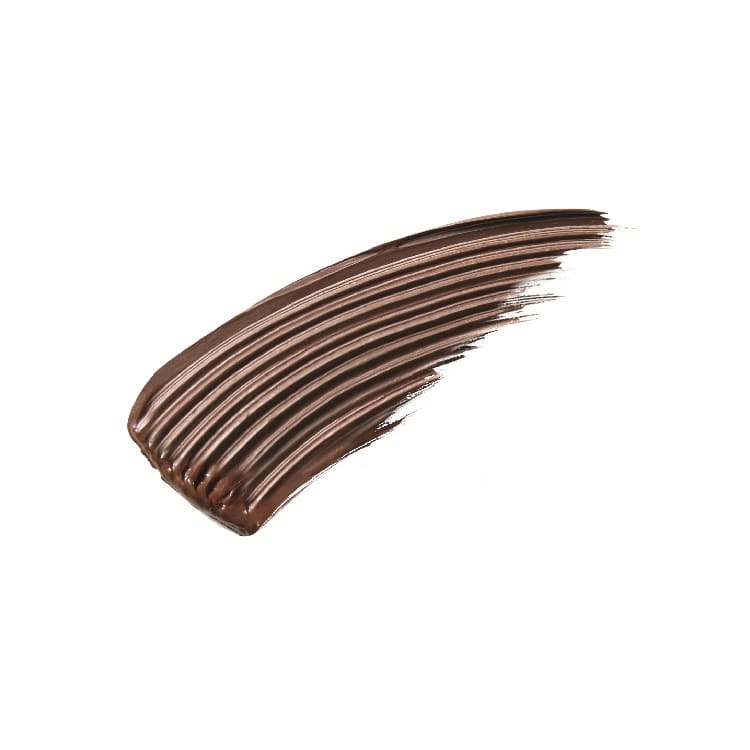Jillstuart Blooming Lash Film Curler creating long, defined eyelashes for a professional makeup finish