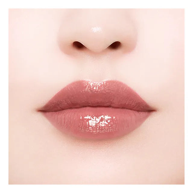 Jill Stuart Lip Lacquer in vibrant shades for a glossy and elegant finish