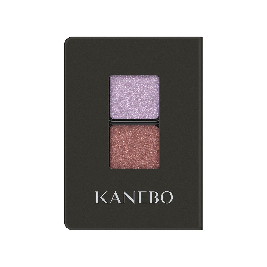 Kanebo Eye Color Duo featuring lavender and rose gold shades in a stylish black compact, perfect for soft and elegant eye makeup.