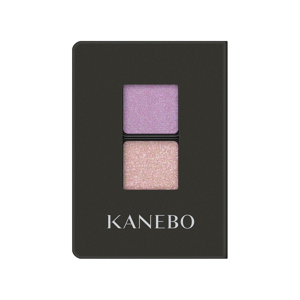 Kanebo Eye Color Duo with pink and champagne shimmer shades in a compact design, ideal for radiant and luminous eye makeup.