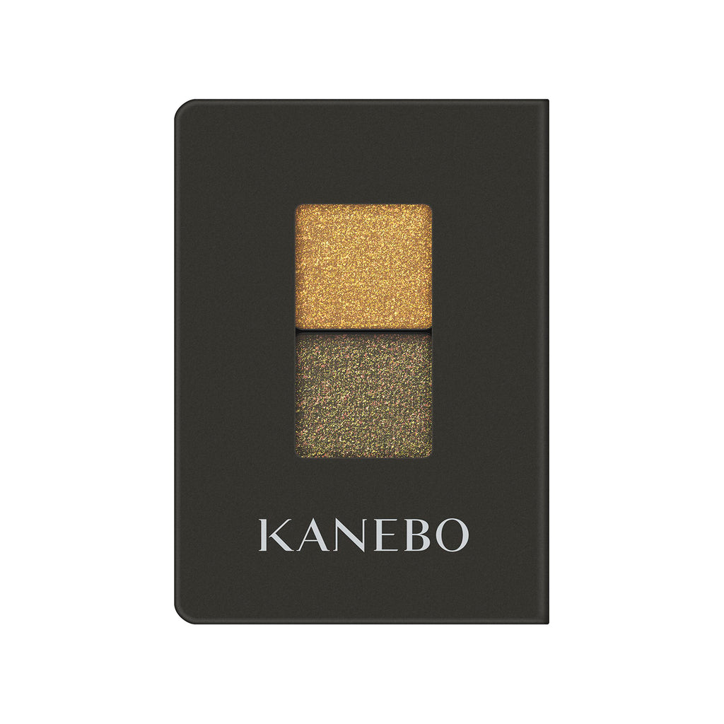 Kanebo Eye Color Duo featuring metallic gold and green shades in a black compact, perfect for bold and striking eye makeup.