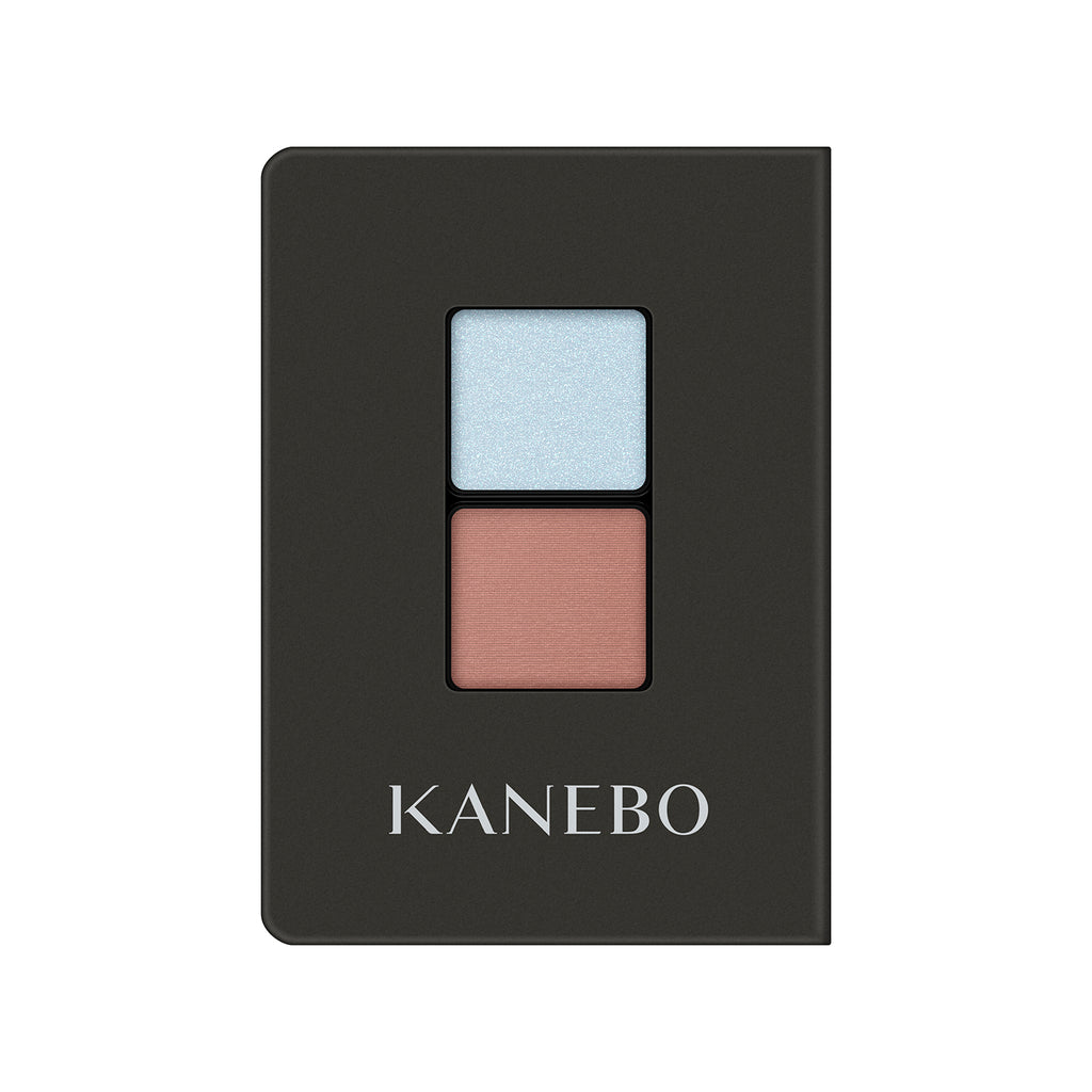 Kanebo Eye Color Duo featuring sky blue and terracotta shades in a black compact, perfect for unique and creative eye makeup.