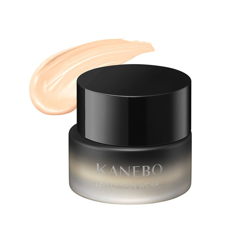 Kanebo Lively Skin Wear 30g foundation in a black jar with a swatch of light ivory shade, designed for a natural and luminous finish.