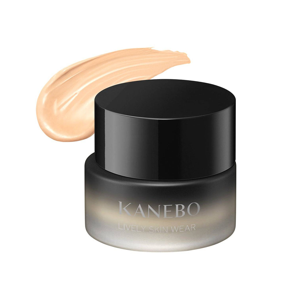 Kanebo Lively Skin Wear 30g foundation in a black jar with a swatch of light neutral shade, ideal for a flawless and vibrant complexion.