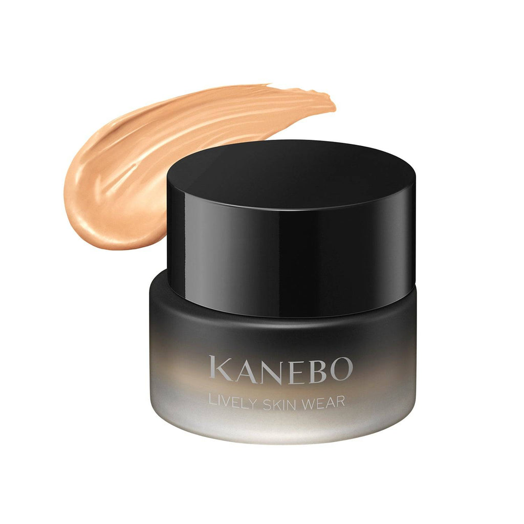 Kanebo Lively Skin Wear 30g foundation in a black jar with a swatch of tan shade, offering a natural and glowing skin finish.