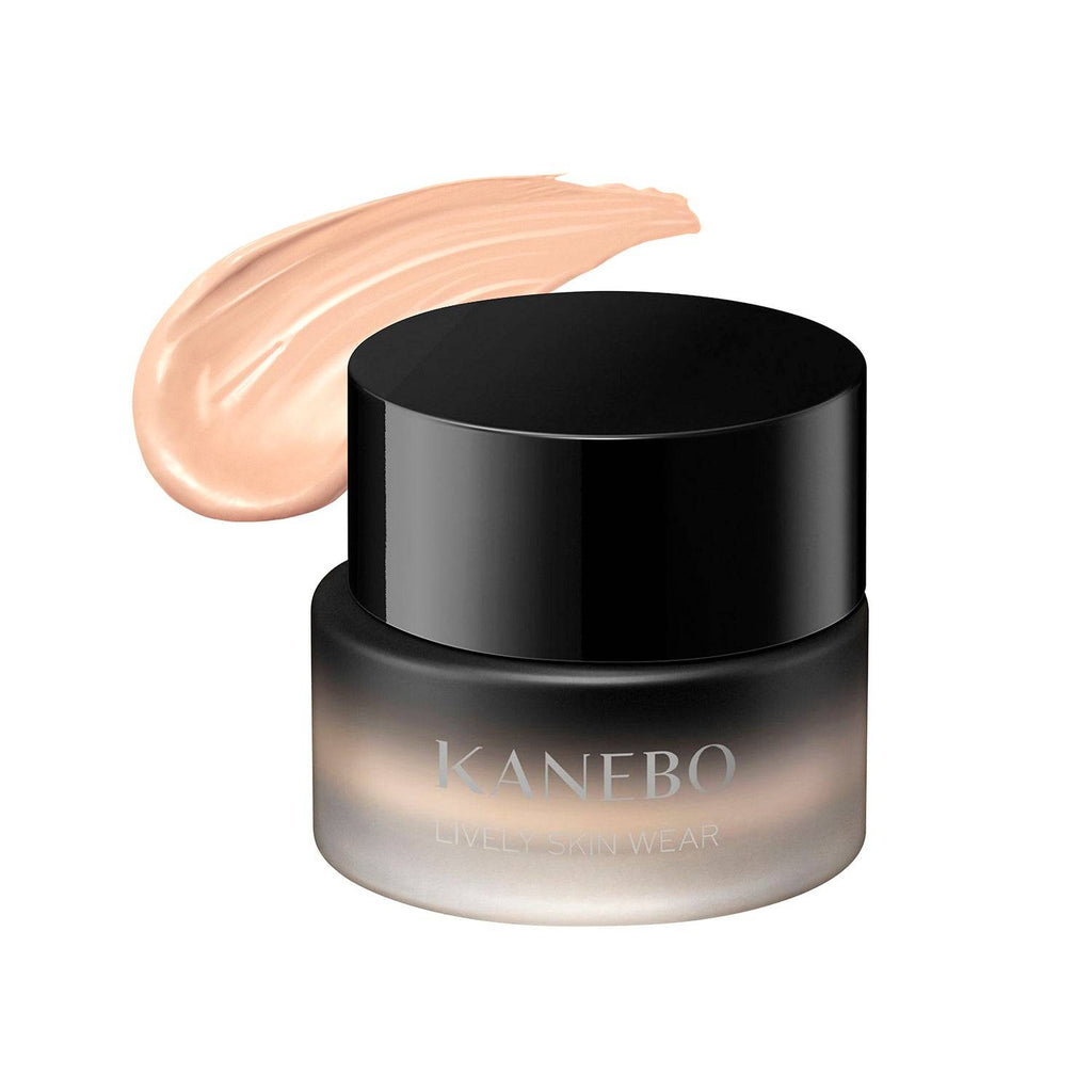 Kanebo Lively Skin Wear 30g foundation in a black jar with a swatch of medium beige shade, perfect for smooth and even skin tone.