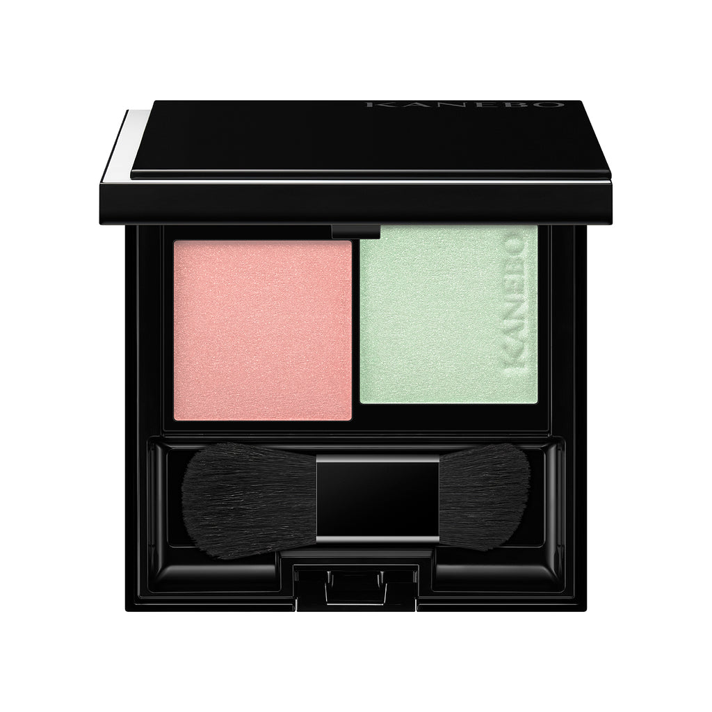 Kanebo Mood Boosting Blush in peach and mint green shades with a compact design, dual brush, and sleek black case.